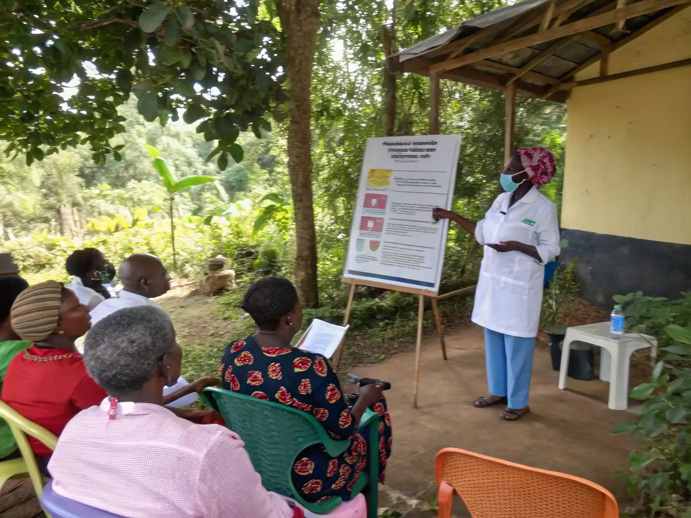 A diverse group of community members participating in a vaccination drive organized by ANPS, showcasing the organization's commitment to primary prevention.